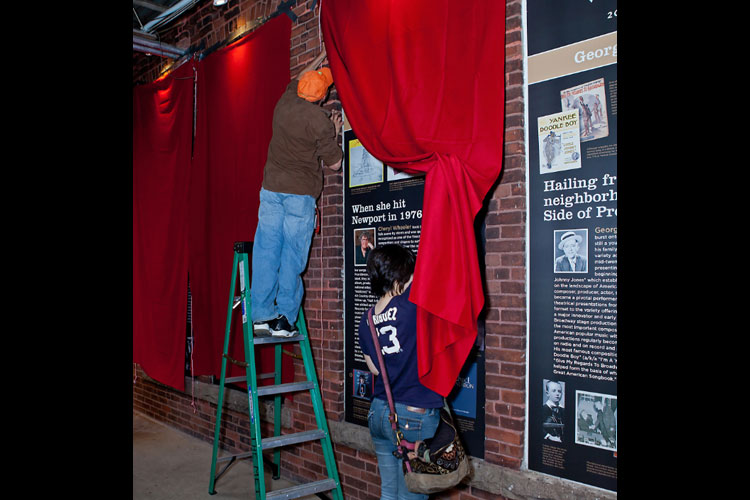 Volunteers and board members arrived early to prepare the Hall of Fame for the exhibit unveilings